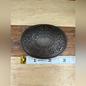 Western belt buckle with floral detail